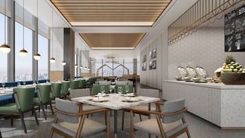 A modern restaurant with a high ceiling, large windows, and a view of the city.