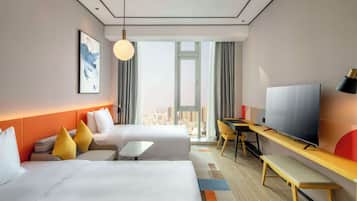 Premium bedding, down comforters, in-room safe, desk