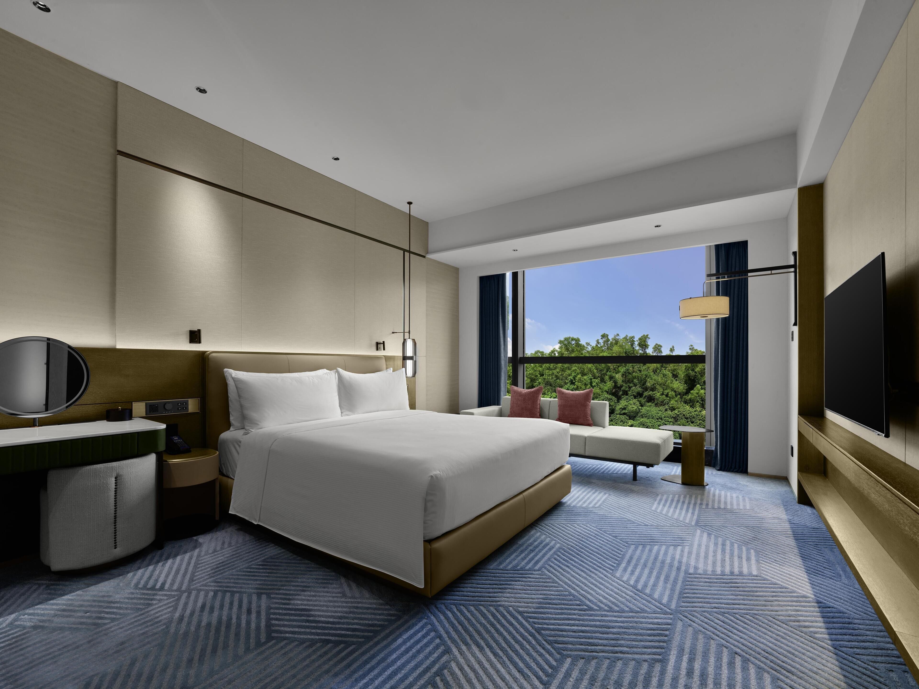 Suite Premium, 1 très grand lit | Coin séjour | TV connectée de 55 pouces avec chaînes numériques, jouets, livres