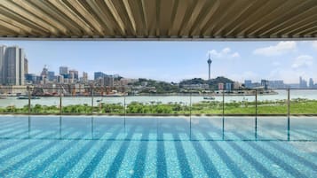 Indoor pool, open 6:00 AM to 10:00 PM, pool loungers, lifeguards on site
