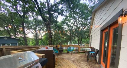 Spacious Modern Lake Retreat w/ Deck! Only a short Walk to Swimming and Fishing!