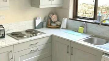 House, Multiple Beds | Private kitchen