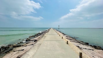Beach nearby, sun loungers