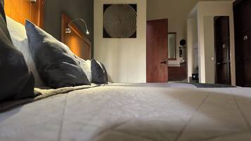 Down duvets, memory-foam beds, desk, laptop workspace