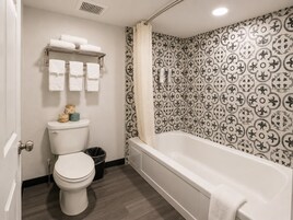 Bathtub, deep soaking tub, free toiletries, towels