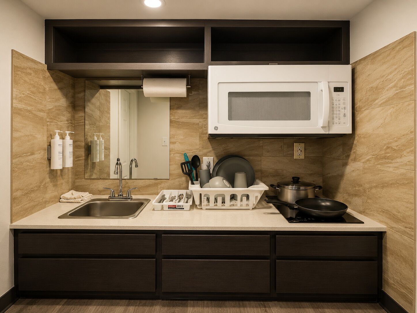 Full-size fridge, microwave, stovetop, coffee/tea maker