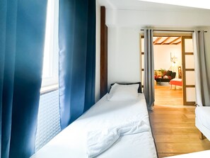 2 slaapkamers, een strijkplank/strijkijzer, gratis wifi, beddengoed