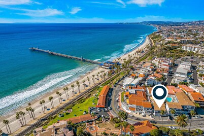 Dog-friendly condo with an ocean view, balcony & pool - beach across the street