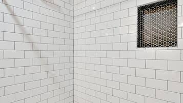 Combined shower/bathtub, hair dryer, towels, soap
