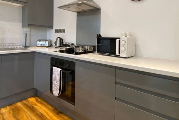 Fridge, stovetop, dining tables