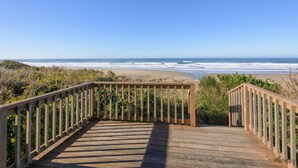 A wooden boardwalk leading to a beach with ocean views. - New Listing! Cozy beachfront home on famed Heceta Beach, amazing sunsets (Florence)