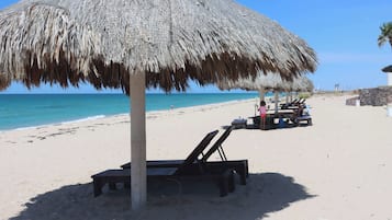 On the beach, beach towels