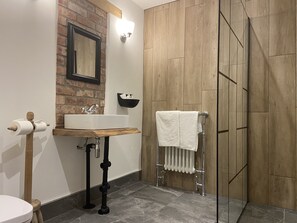 Superior Room | Bathroom | Shower, rainfall showerhead, designer toiletries, hair dryer