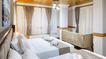 Ropa de cama de alta calidad y minibar