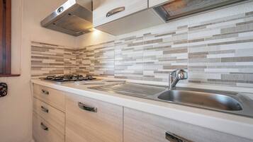 Réfrigérateur, four, plaque de cuisson, lave-vaisselle