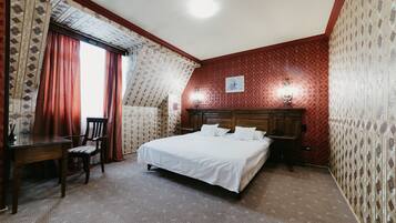 Suite estudio Deluxe | Escritorio y espacio para trabajar con un portátil