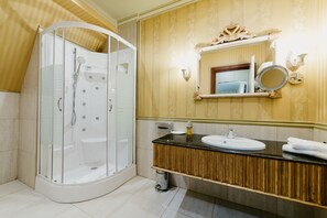 Shower, hair dryer, towels, soap