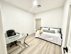 4 bedrooms, desk, iron/ironing board, travel crib