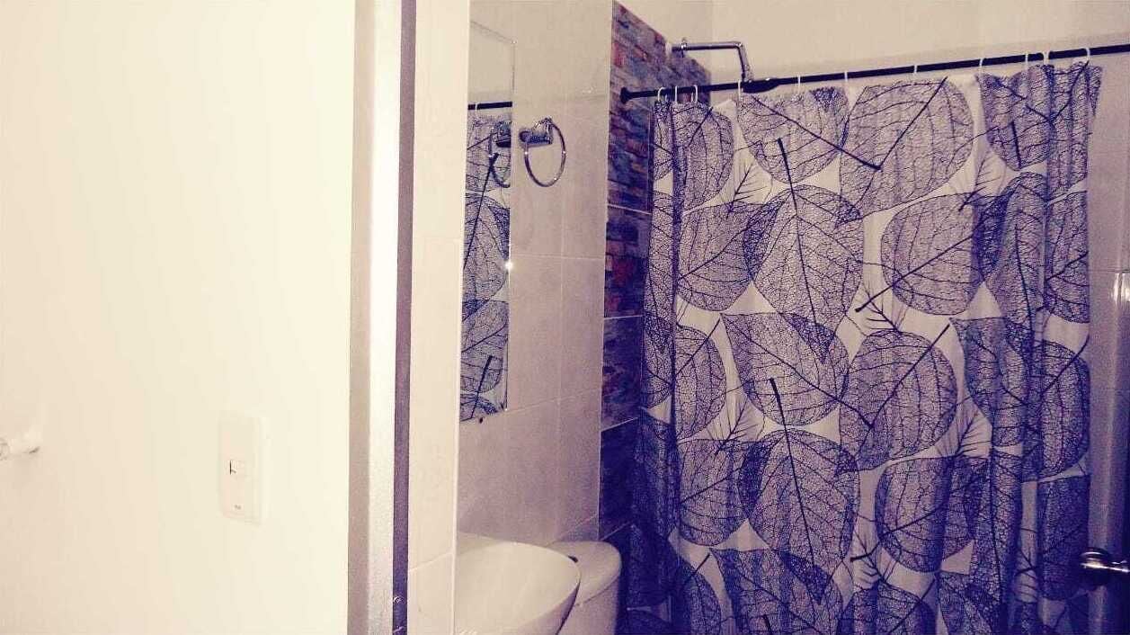 Shower, towels, soap, toilet paper