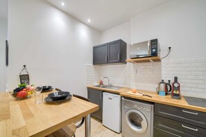 Fridge, microwave, coffee/tea maker, toaster