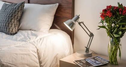 Truck bed size kitchen. Large shed size living room avarge tub. Toilet sink. Si