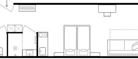 A floor plan of a hotel room with a bed, a desk, a wardrobe, a bathroom, and a window.