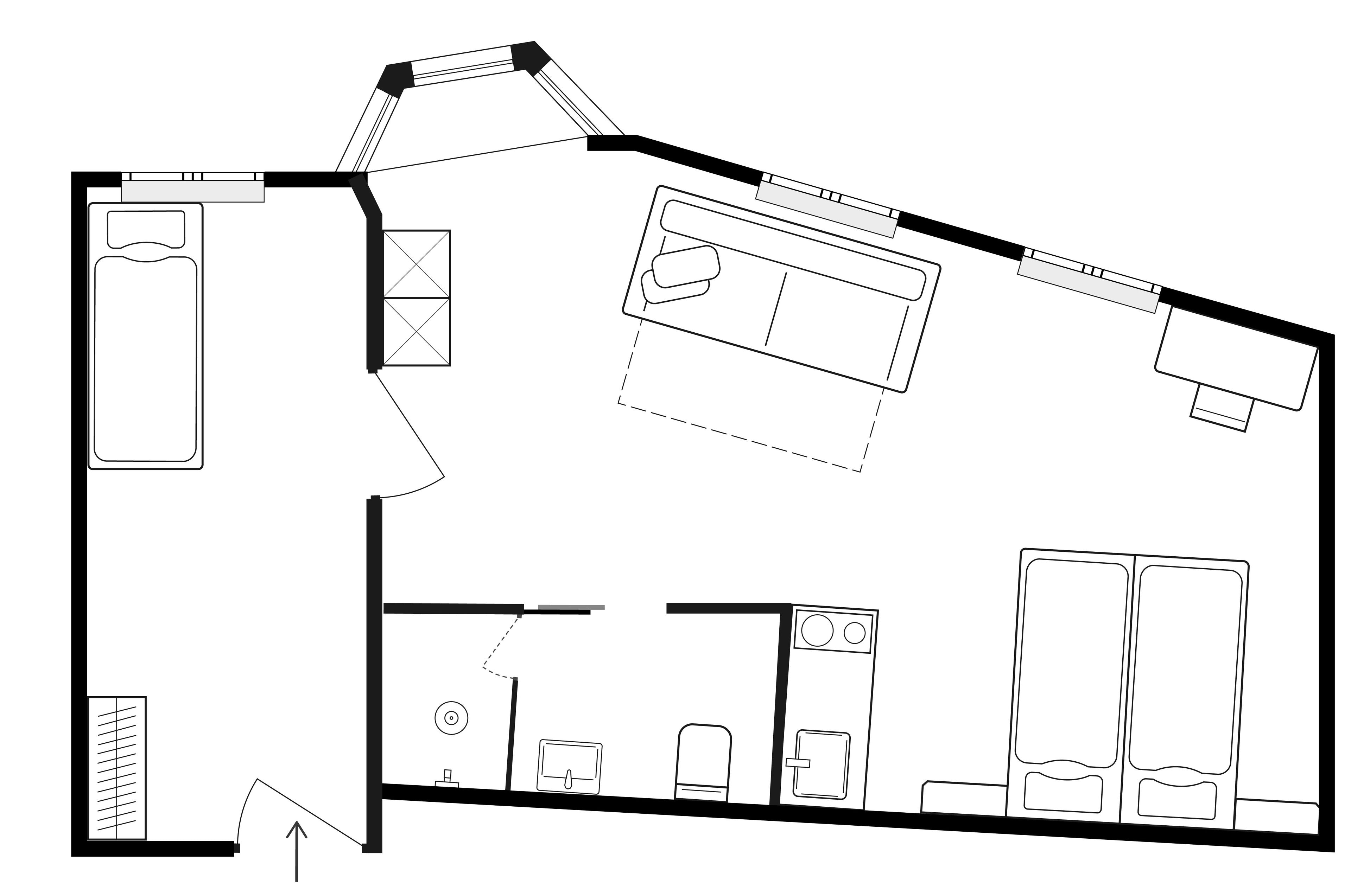 Plano de planta que muestra una cocina, un comedor y dos dormitorios.