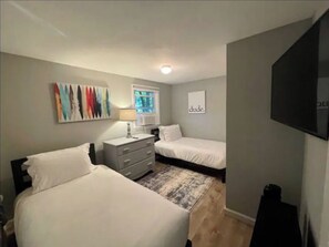 2 bedrooms, desk, iron/ironing board, travel cot