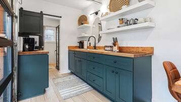 Fridge, microwave, stovetop, coffee/tea maker