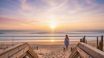 On the beach, sun-loungers, beach towels