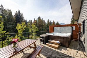 Outdoor spa tub - Pillow Top Condo by Revelstoke Vacations (Revelstoke)