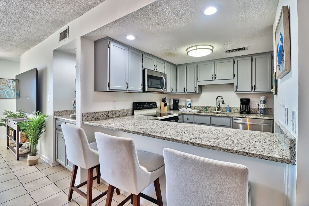 Frigorifero, microonde, forno, piano cottura