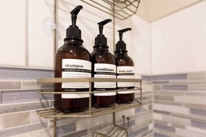 Bathtub, hair dryer, towels