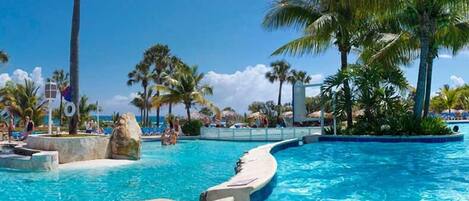 14 outdoor pools, open 8:00 AM to 11:00 PM, free cabanas, pool umbrellas