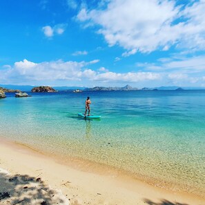 Private beach, white sand, sun-loungers, beach umbrellas
