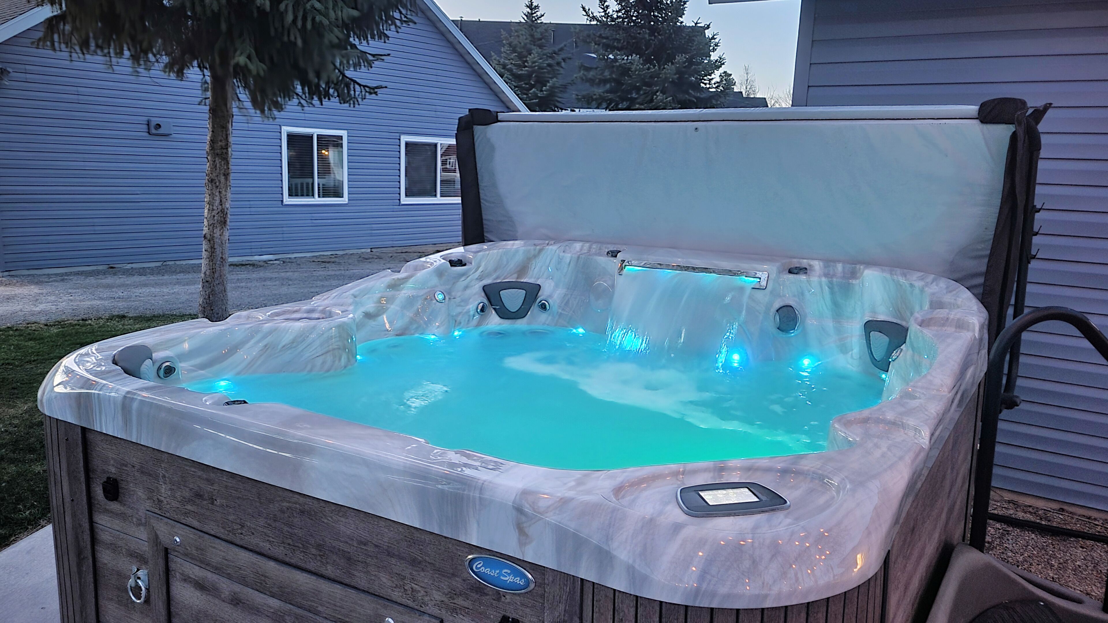 Hot Tub with LED lights and a waterfall feature