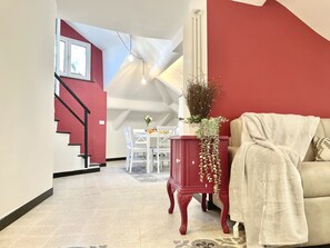 Family Condo | Living area | TV, toys - Happy Family Apartments The Roof (Genoa)