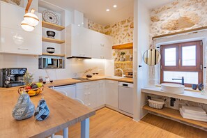 Studio | Cuisine privée | Réfrigérateur, micro-ondes, four, plaque de cuisson