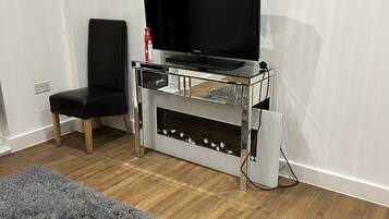 Apartment, 1 Queen Bed | 1 bedroom, iron/ironing board, free WiFi, bed sheets