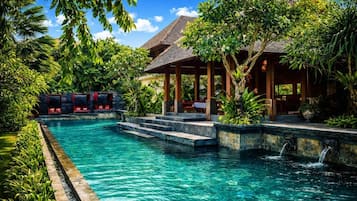 Outdoor pool, open 7:00 AM to 7:00 PM, free cabanas