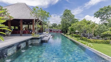 Outdoor pool, open 7:00 AM to 7:00 PM, free cabanas
