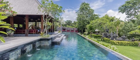 Outdoor pool, open 7:00 AM to 7:00 PM, free cabanas