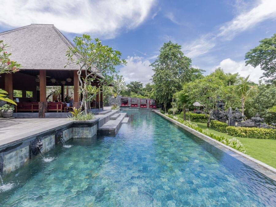 Outdoor pool, open 7:00 AM to 7:00 PM, free cabanas
