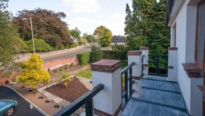 A residential balcony with a view of a street and houses. - The Old Mount Manor, Causeway Coast (Coleraine)