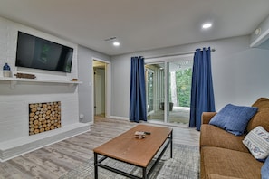 Smart TV, fireplace, books