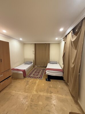Laptop workspace, iron/ironing board, free WiFi, bed sheets
