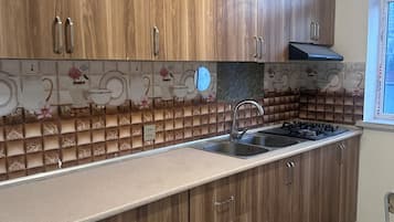 Family Room, Kitchen, Garden Area | Private kitchen