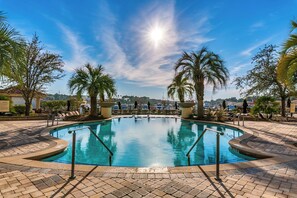 A heated pool, pool umbrellas