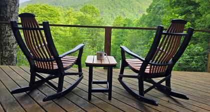 Private retreat with mountain views and a cascading creek on 3 acres. Fast wifi