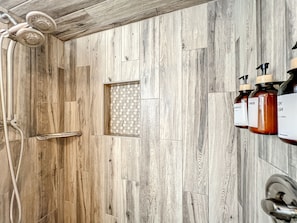 Combined shower/tub, hair dryer, towels, soap